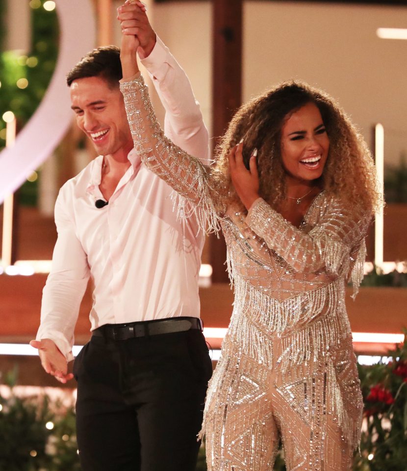  Greg and Amber are celebrating being crowned Love Island's champions