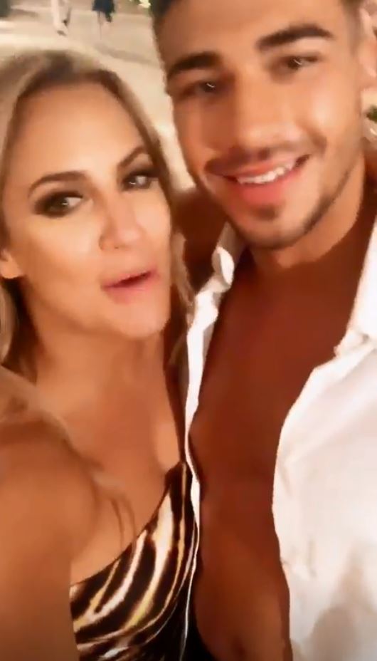  Caroline cuddled up to Tommy Fury at Love Island afterparty on Monday