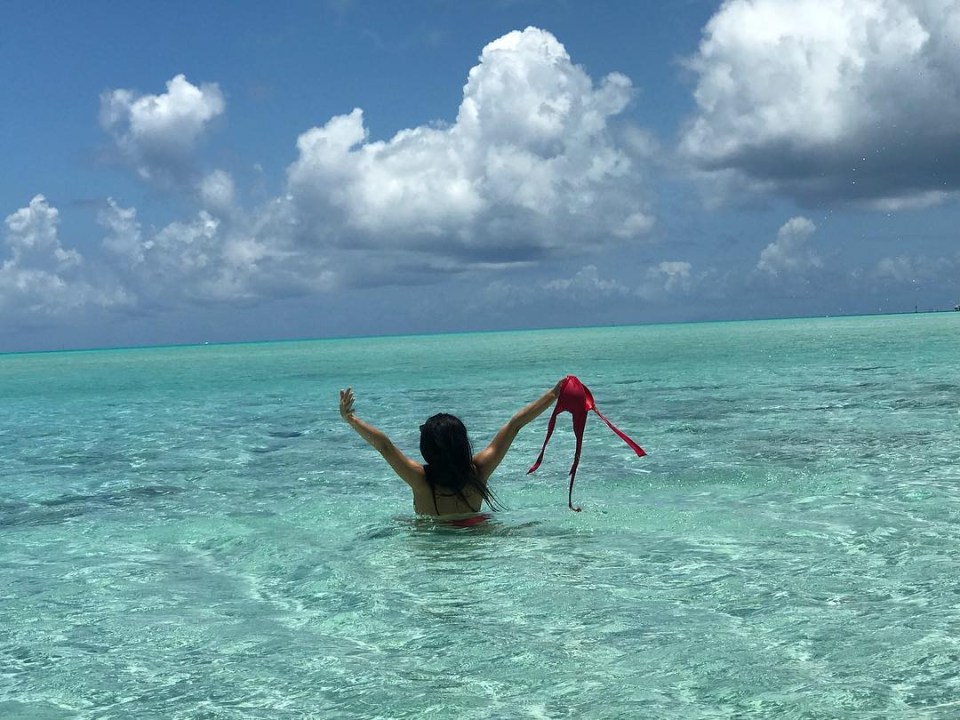  She clearly likes the sea - Nancy is often seen posing in the water