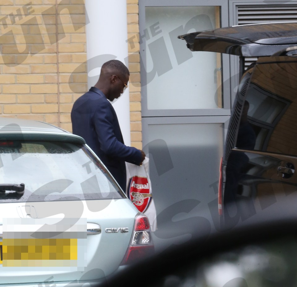 The winger peered into the Gunners bag to check out his welcome gifts