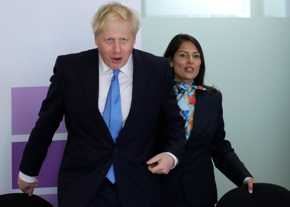 PM Boris Johnson with Home Secretary Priti Patel