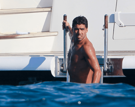  Luis Suarez is first in for a dip - as he battles to keep his Barcelona career afloat