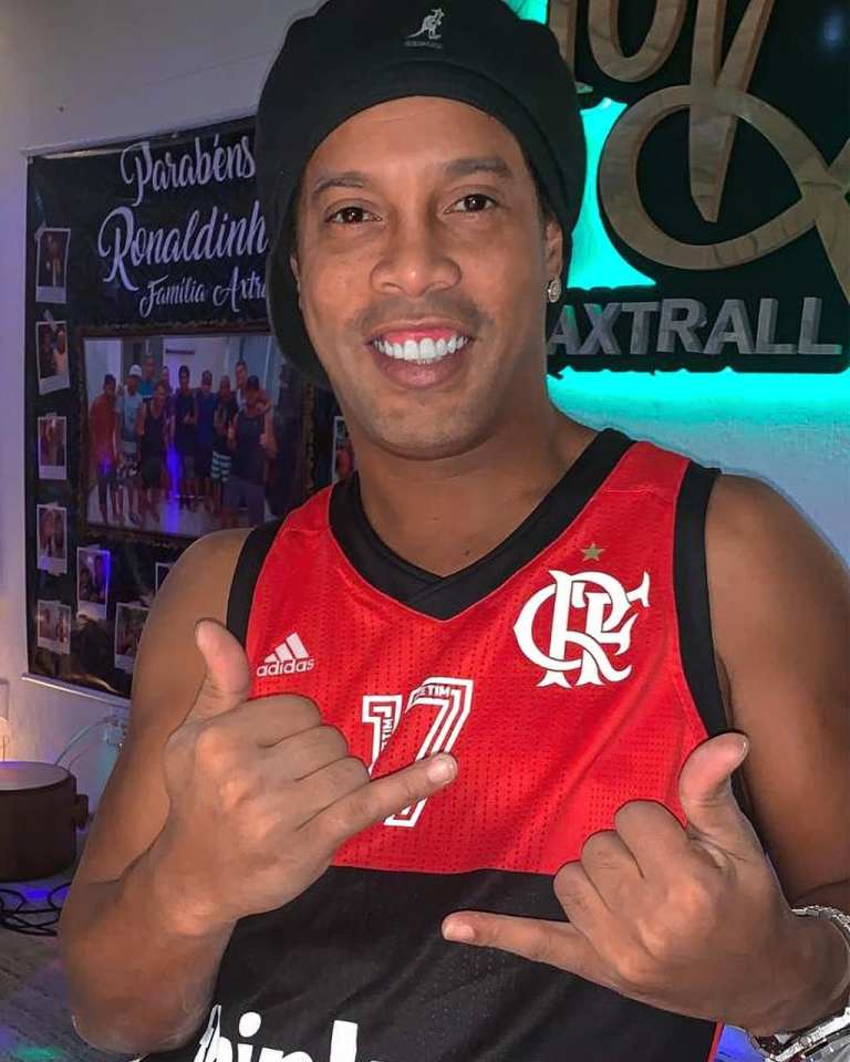  Ronaldinho has had his passports seized until he pays off outstanding debts after being fined for building a pier at his lake home