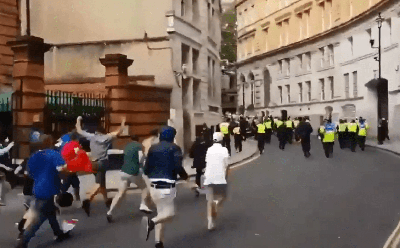  Robinson fans chase cops down the street after the verdict