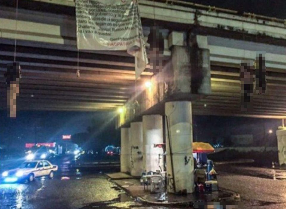  Shocked cops found butchered bodies hanging from an underpass