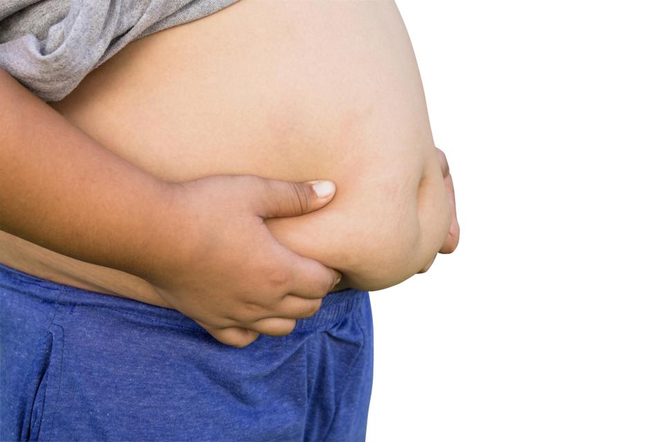  Being fat is almost as likely as smoking to cause cancer, say scientists