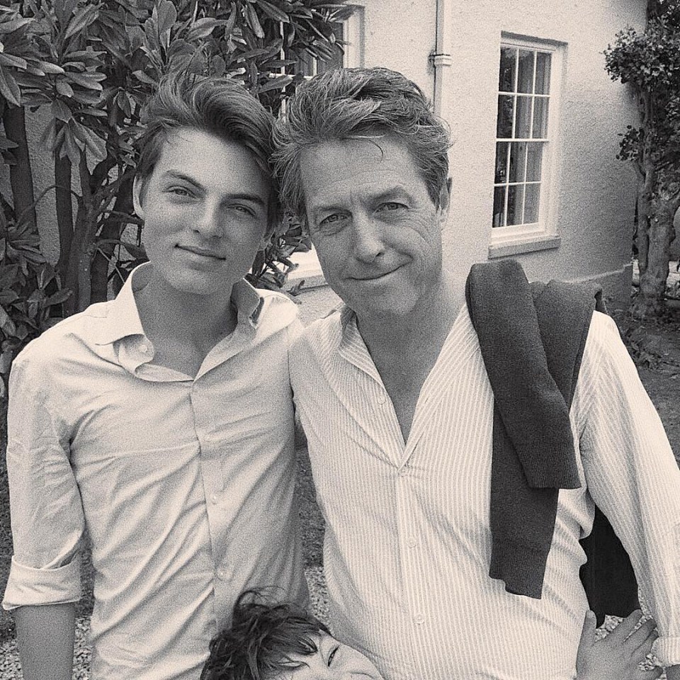  Liz's ex, Hugh Grant, is Damian's godfather