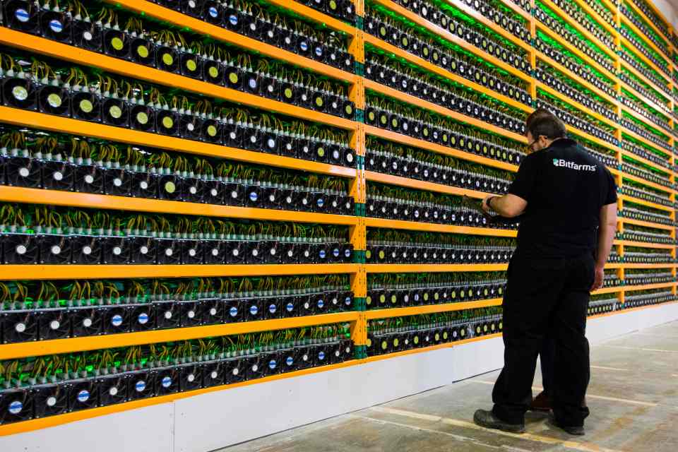  A cryptocurrency farm housing hundreds of hard drives attempting to mine Bitcoin