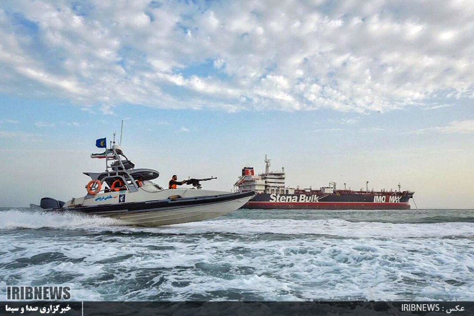  An Iranian Revolutionary Guard jet boat sails around the seized British-flagged tanker Stena Impero in Bandar Abbas