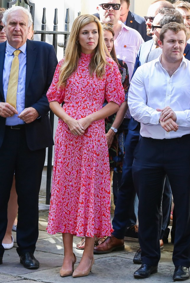 The 31-year-old ex-Tory PR wore a £120 Ghost dress to watch her partner make his first speech as Prime Minister last month