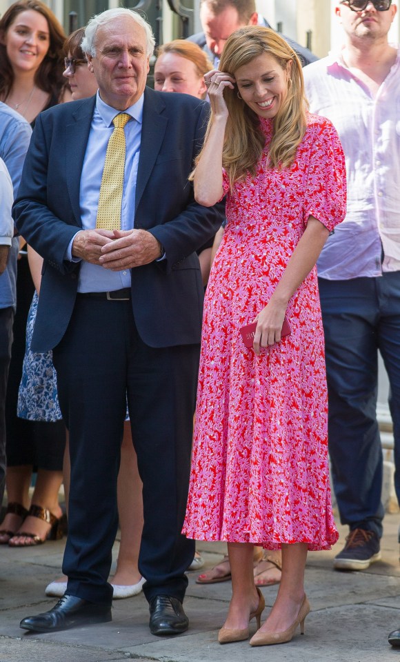  Carrie previously wore a £120 Ghost dress to welcome Boris Johnson to No10 - it sold out almost instantly