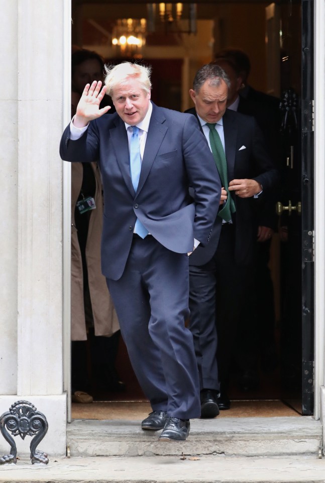  Boris waving to the cameras as he leaves No10 last night