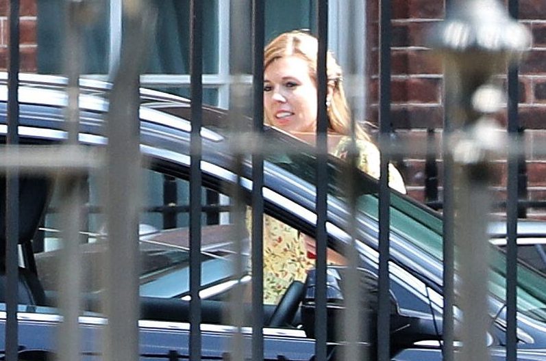  A smiling Carrie was seen leaving No10 this afternoon wearing a summery yellow outfit