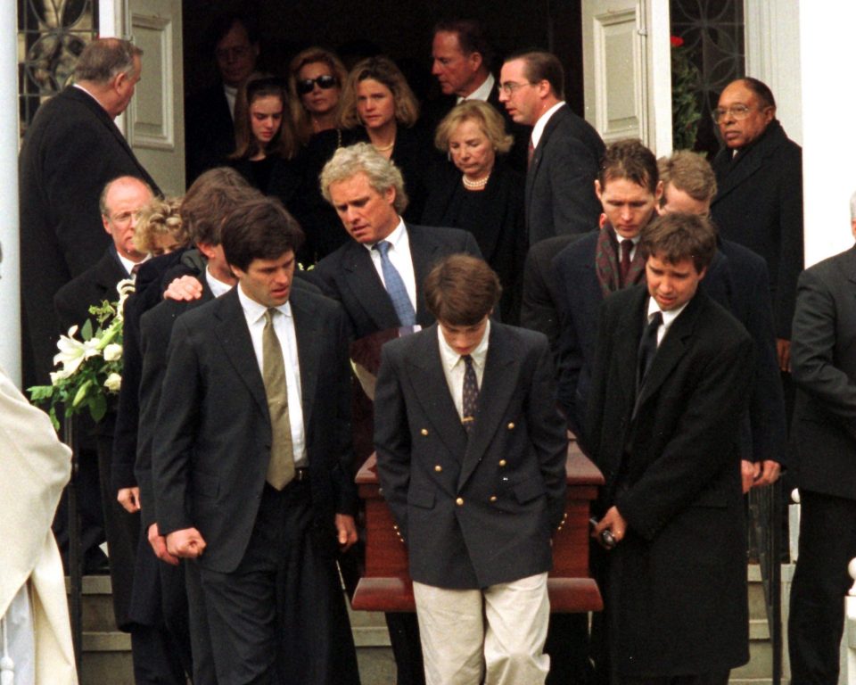 Family members carry the coffin of Michael who was killed in a New Year’s Eve skiing accident