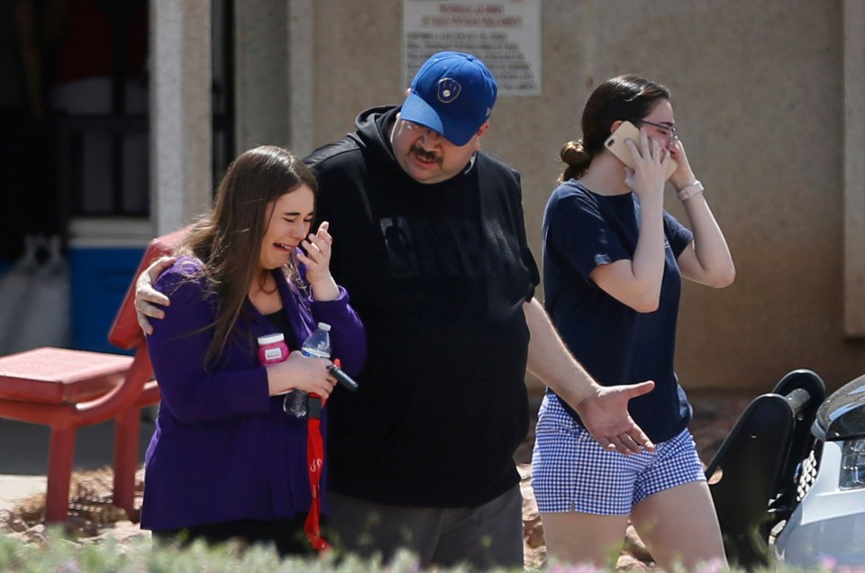  People arrive at MacArthur Elementary looking for family and friends as the school is being used a re-unification centre after the El Paso shooting