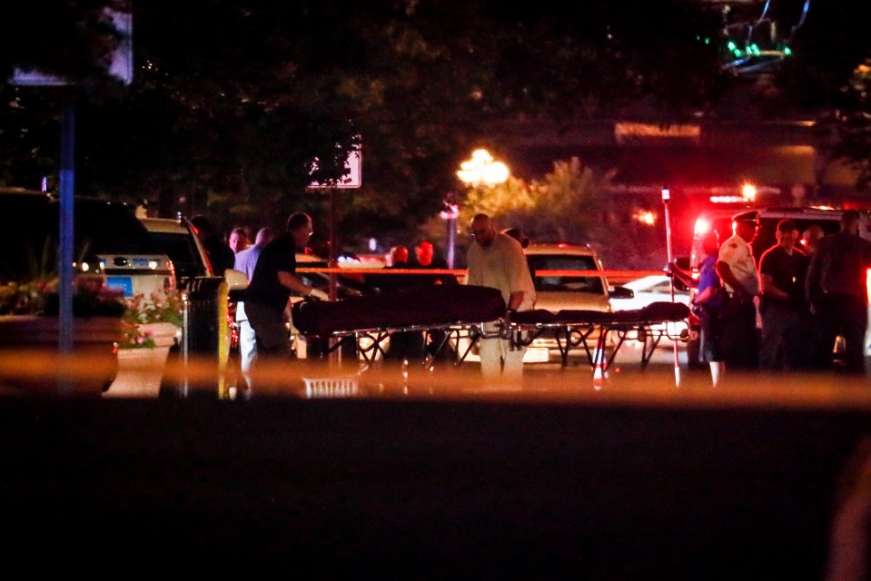  Bodies are removed from the scene of a mass shooting in Dayton, Ohio