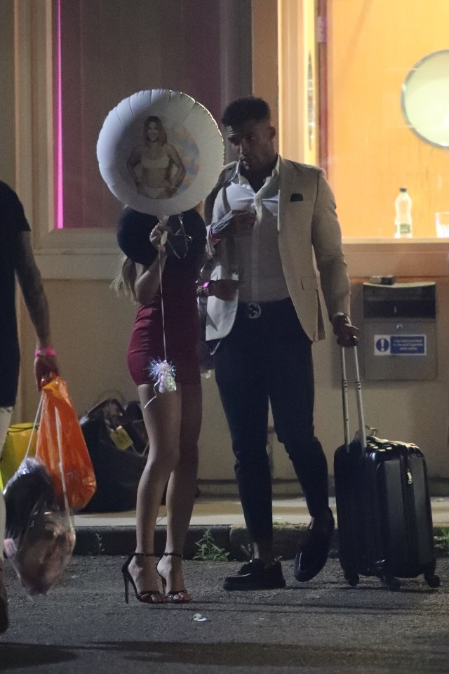  He chatted to Joanna as she held a balloon with her Love Island photo on it