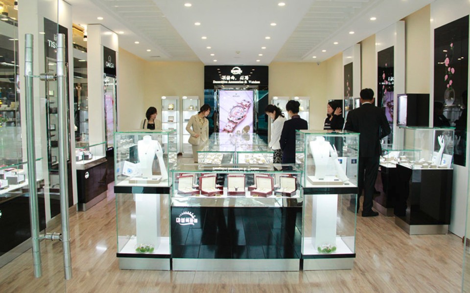 Interior of a North Korean department store displaying luxury goods.