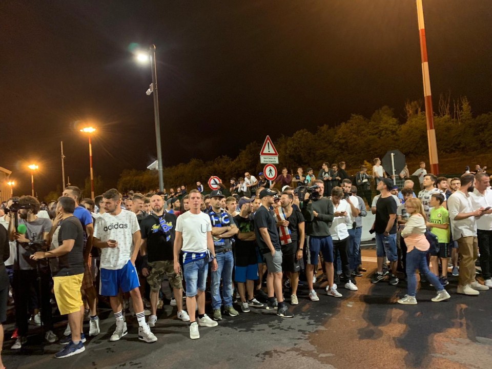  Football fans lined up outside the airport to greet their new signing Romelu Lukaku