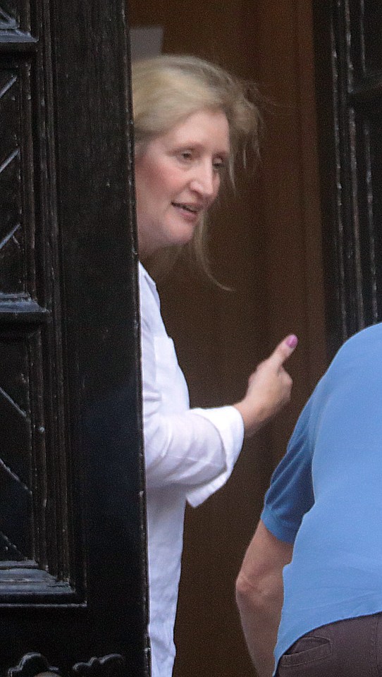  Jane Andrews, 52, gives the thumbs up to a pal helping as she arrives at bail hostel