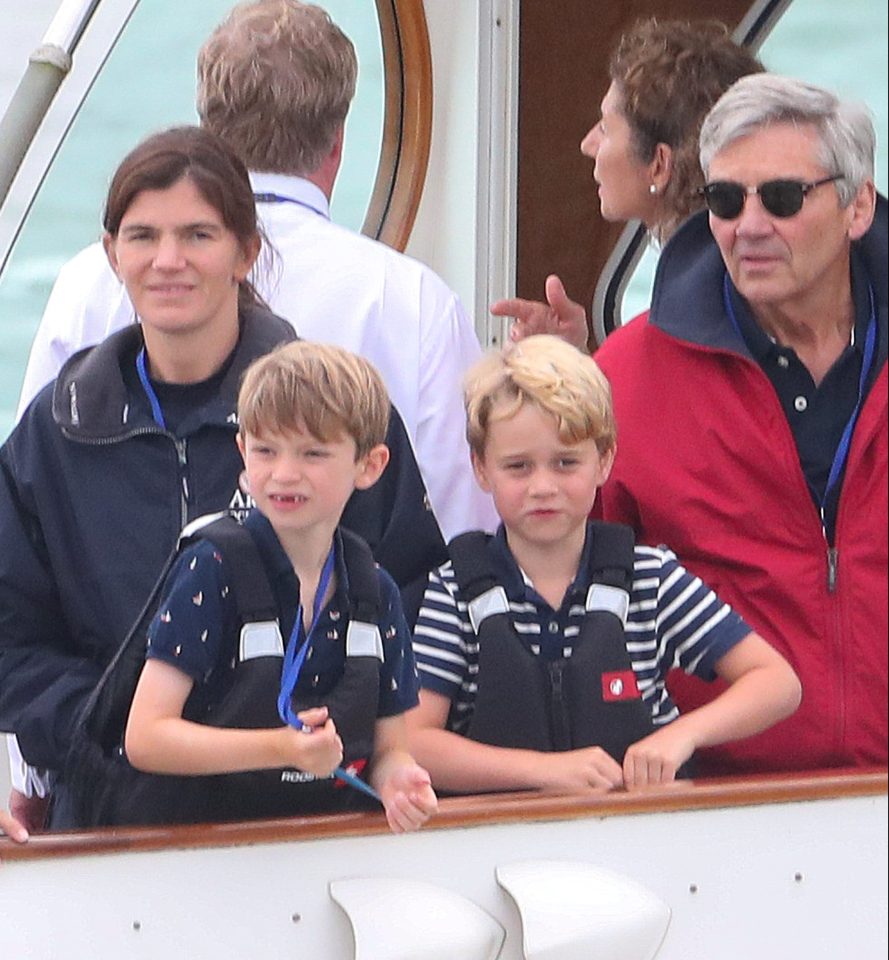 Prince George, six, watched his parents compete in the regatta today along with his grandfather Michael Middleton