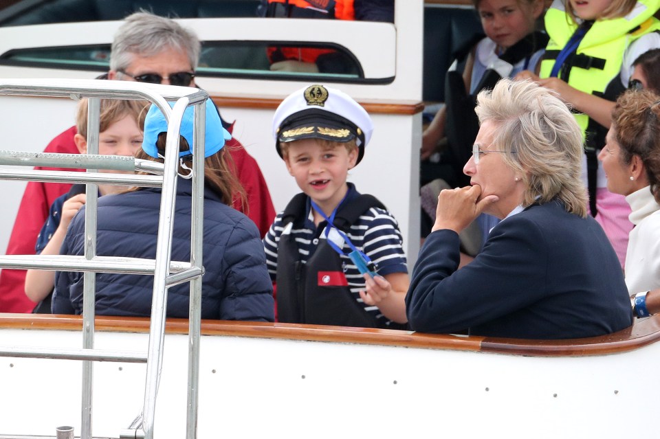 Prince George appeared excited to watch the race