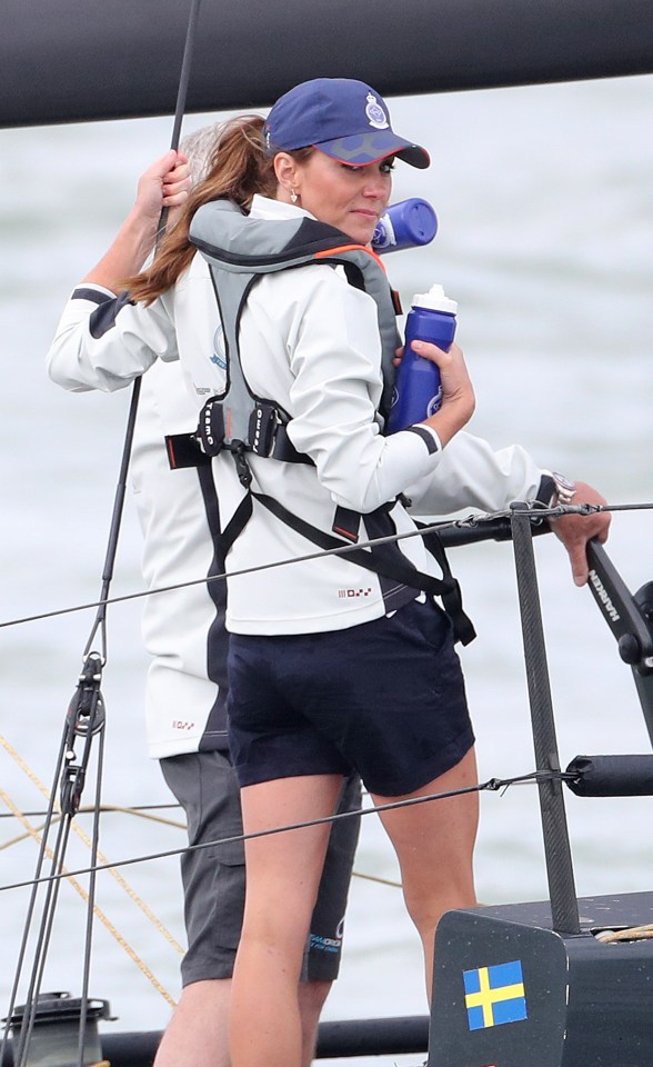 Kate Middleton holds a water bottle during her day out 