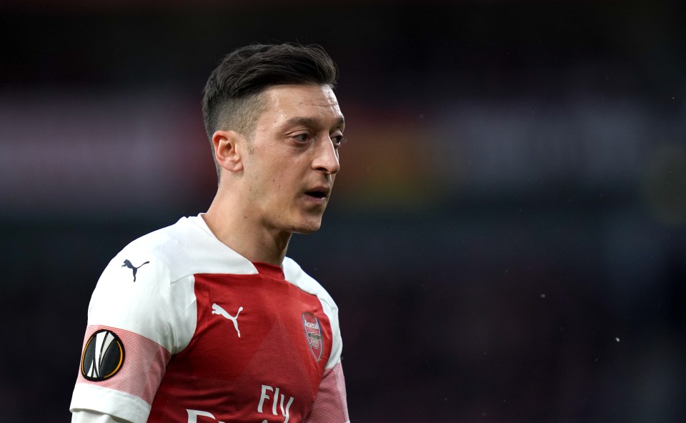  Mesut Ozil tweeted a message of support to his Arsenal team-mates having missed the Newcastle clash amid gang war terror