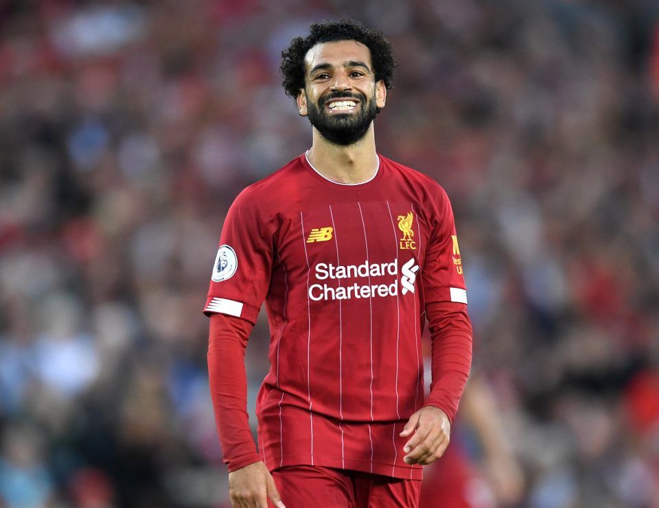 The Egyptian King grins as he gets off the mark in the first game of the season