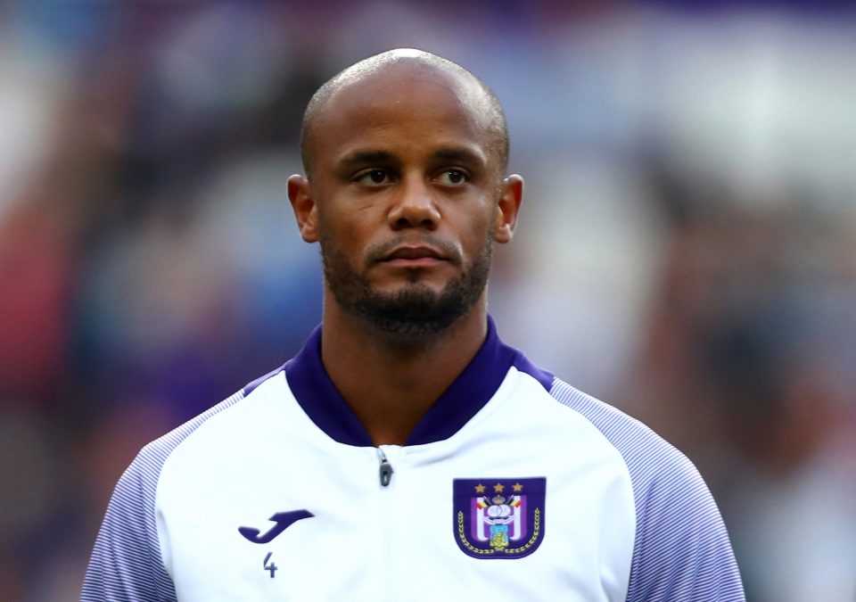  Kompany, 33, will rely on former Man Utd player Davies for tactical guidance