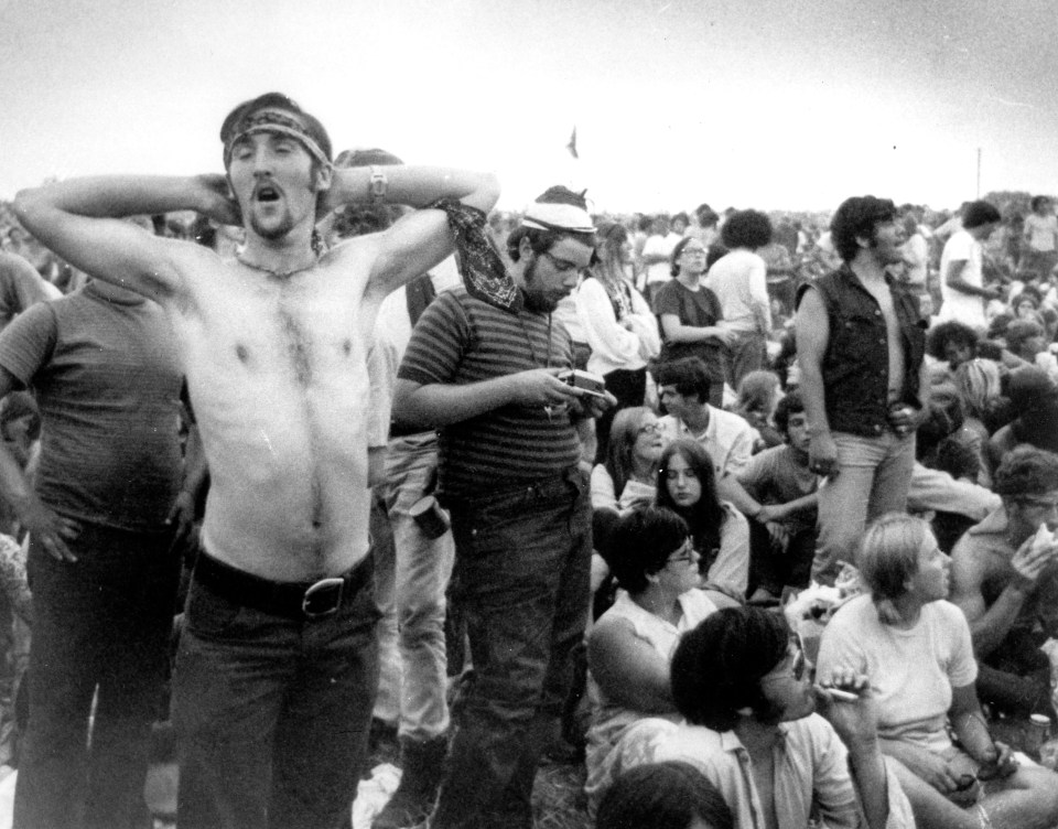  Rock music fans relax during a break in the entertainment. Woodstock was notable for widespread drug use by performers and fans, although only about 100 arrests were made and there were no reported incidents of violence