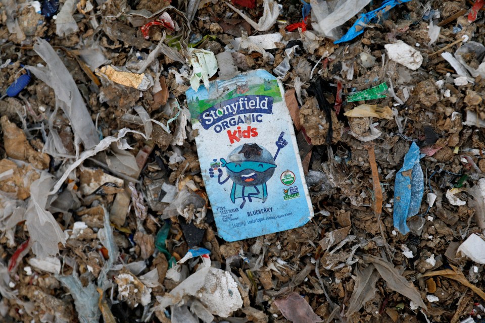  Plastic waste from food packaging is pictured among the rubbish