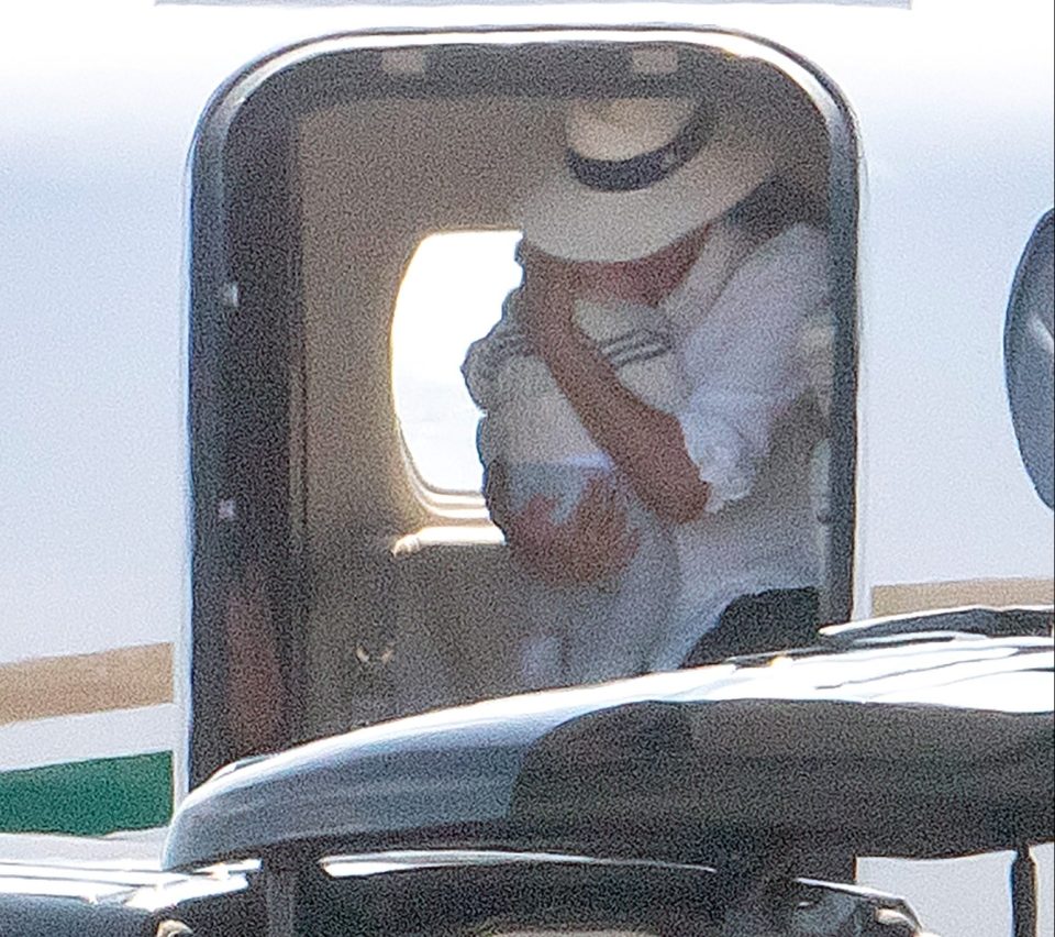  Covering her face, Meghan was pictured arriving in Nice on Wednesday