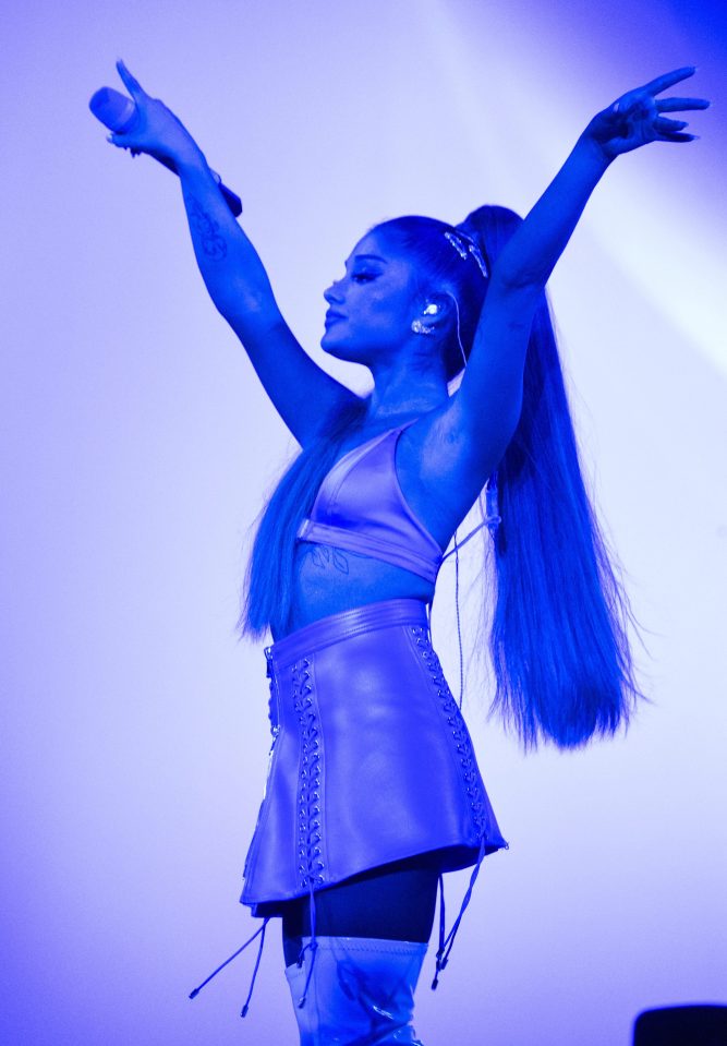  The pop sensation in one of several costume changes during her performance at London's O2 Arena