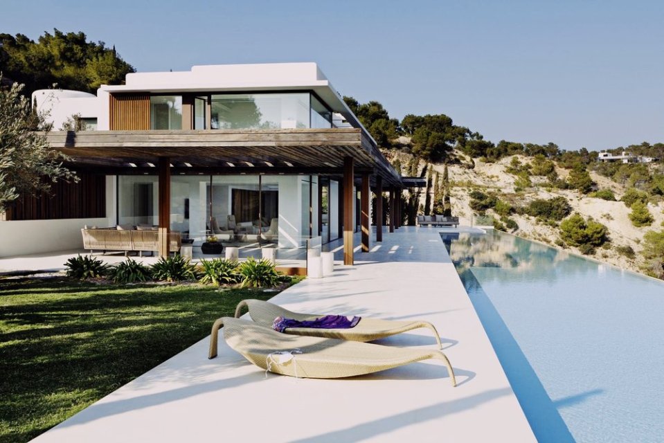  A 50-metre infinity pool lined the front of the villa with views of the sea and the surrounding mountains