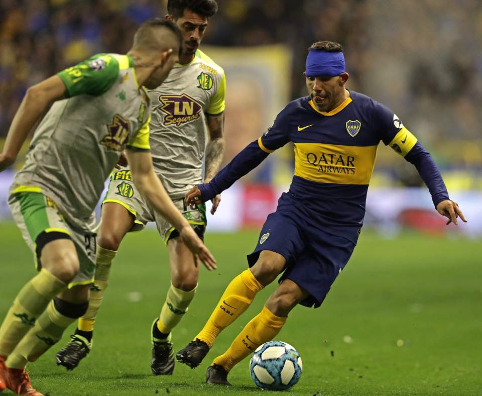  Ex-Man City striker Tevez donned a blue headband during the home fixture