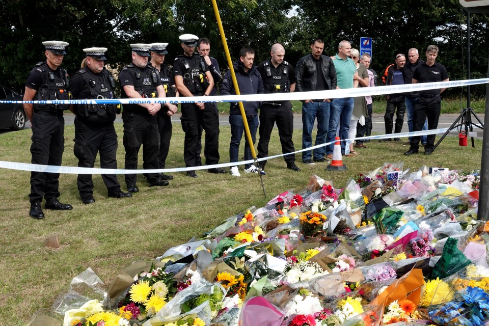 Fellow officers from Thames Valley Police honour PC Harper