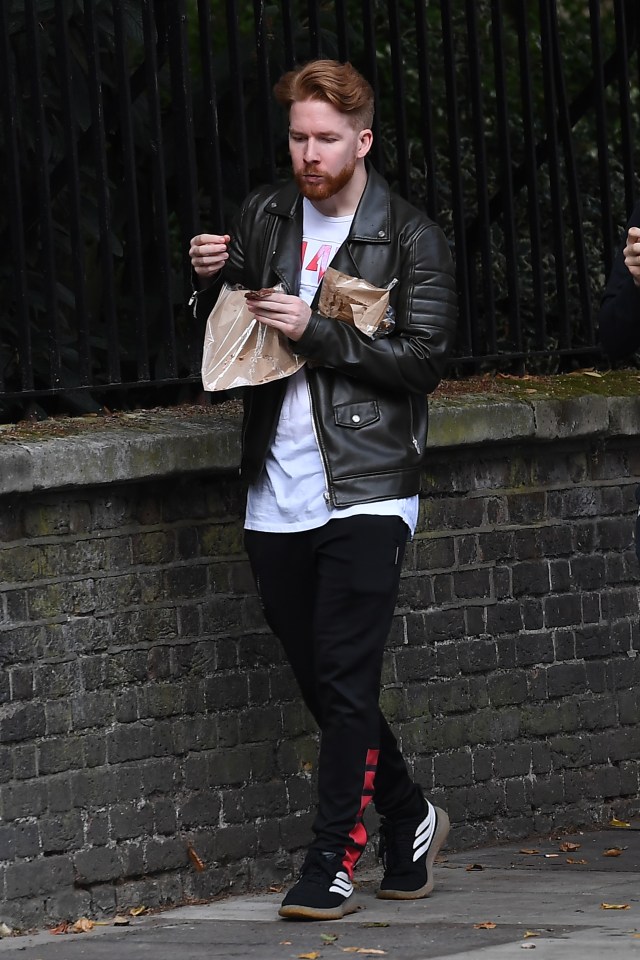  Neil Jones was also spotted without his wedding ring as he returned to work