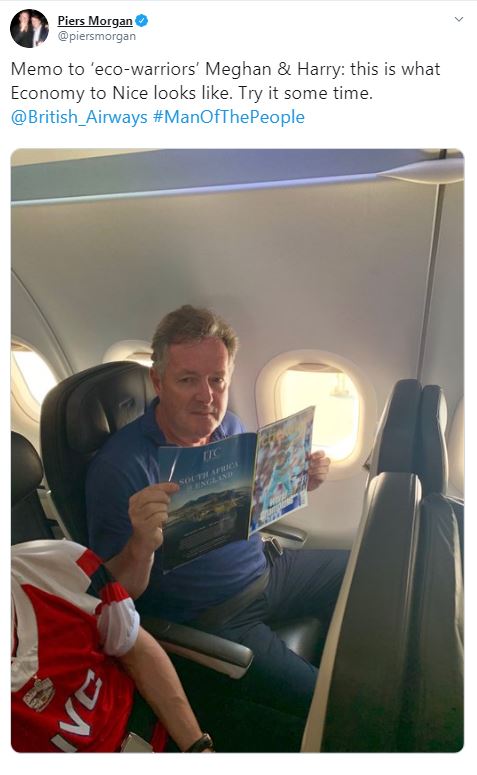 TV host Piers Morgan gave a dig at Meghan and Prince Harry’s private jet trips by today sharing a photo of himself in economy