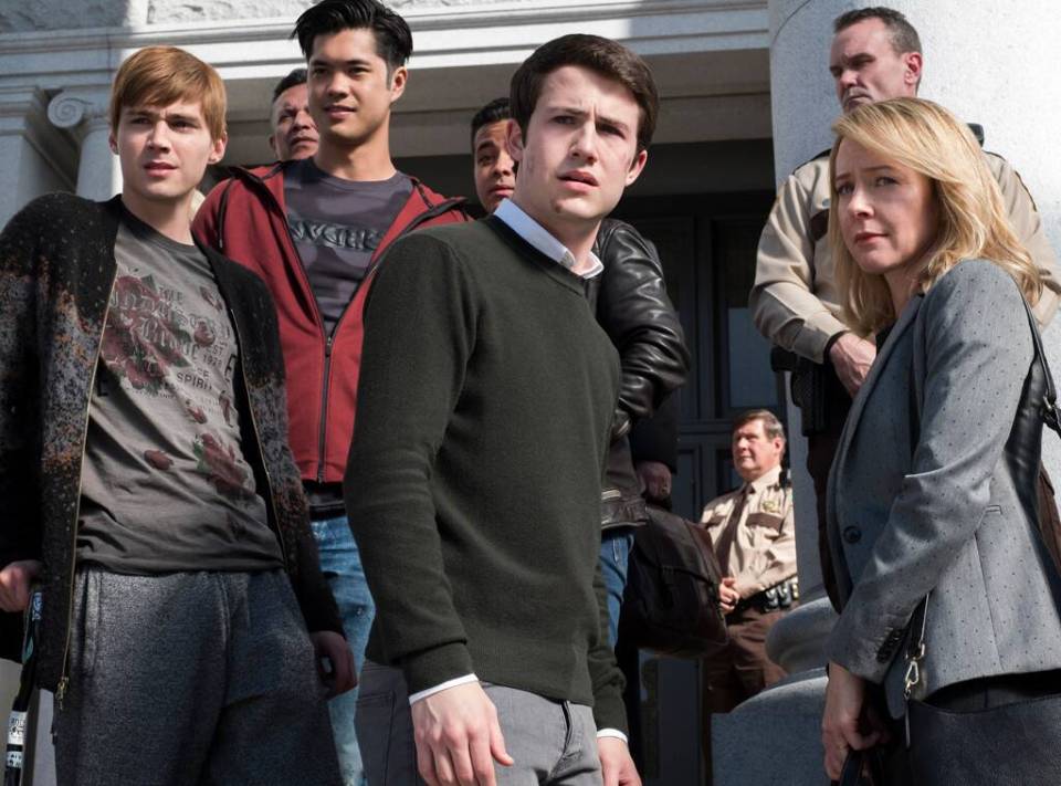 Dylan Minnette (centre) is back as the tormented Clay Jenson