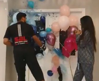  It erupted in blue confetti with the star raving: 'It's a boy'