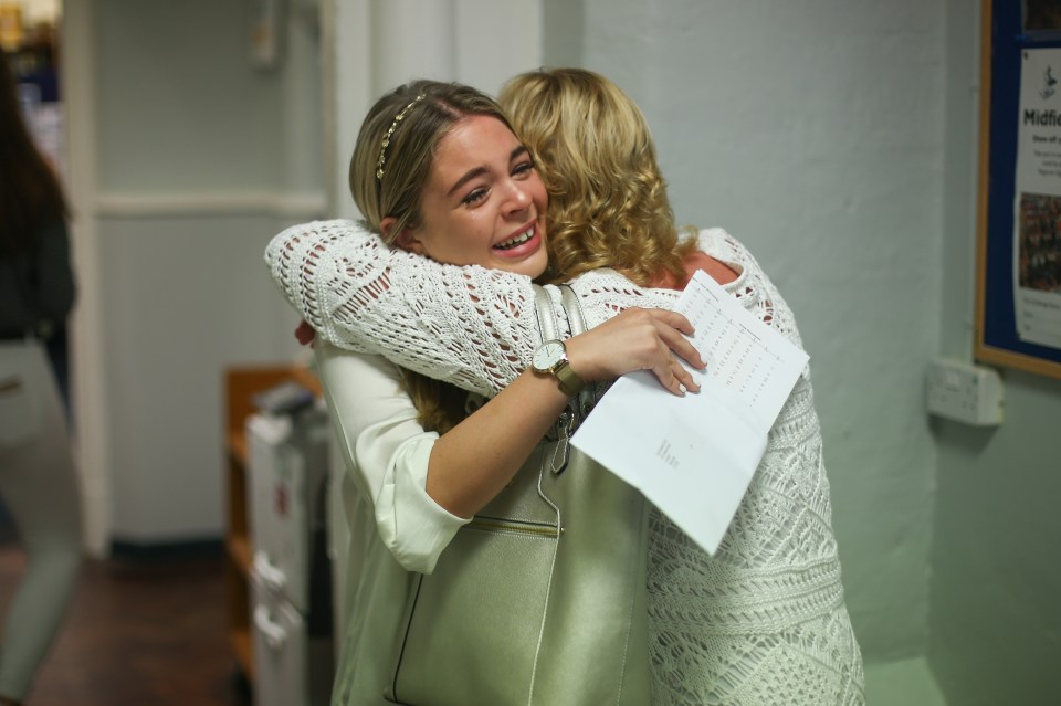  Pupils embrace at Merchant Taylors Girls School in Merseyside