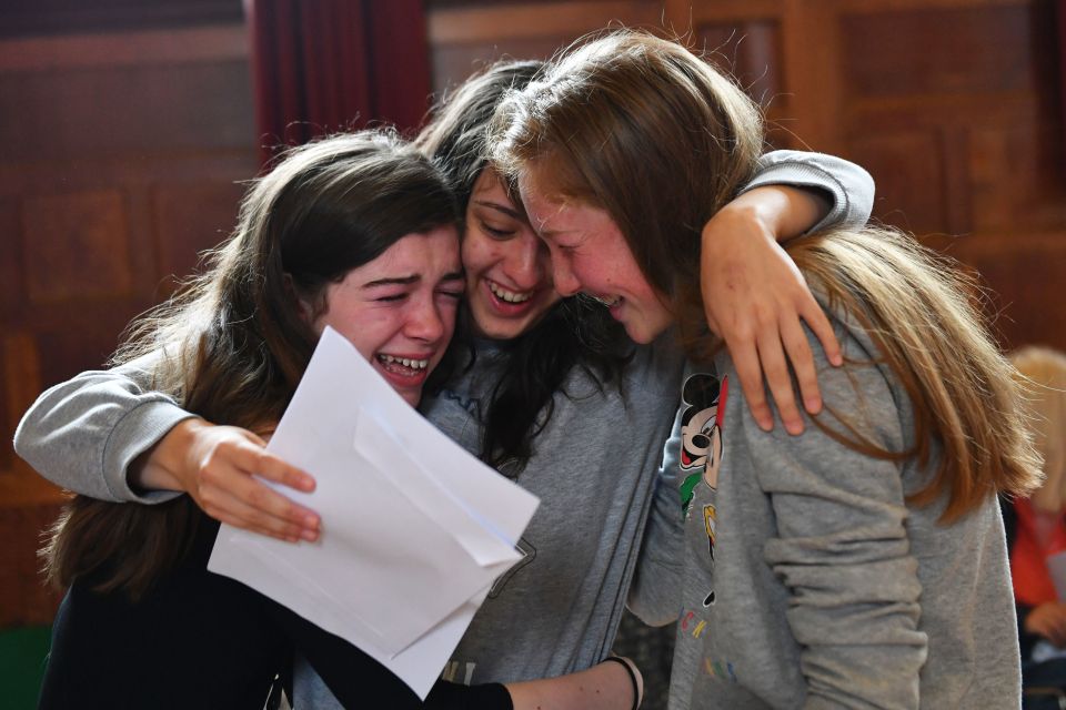  She later wept as she hugged pals Isabel Drugan and Becky Haddon