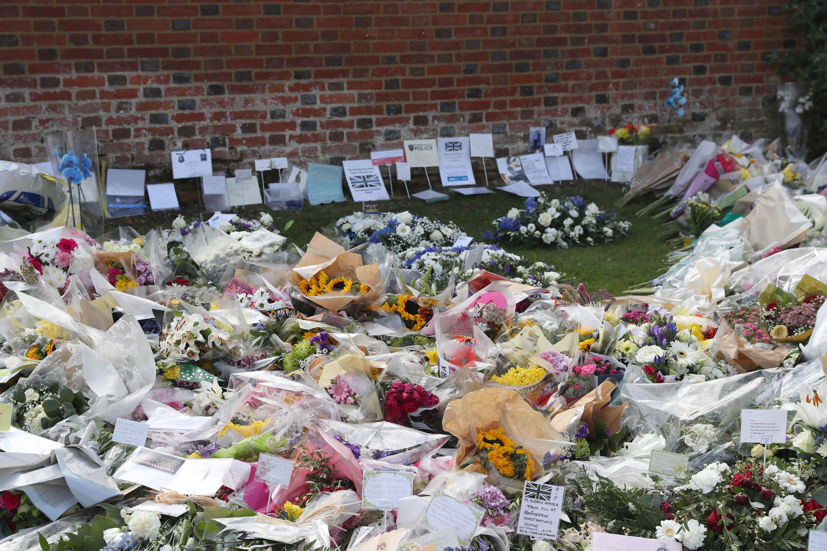  A sea of tributes has been left for PC Harper at his force's training centre