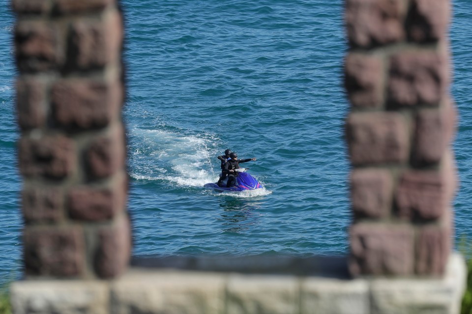  Cops patrol the water around the seaside town ahead of the summit