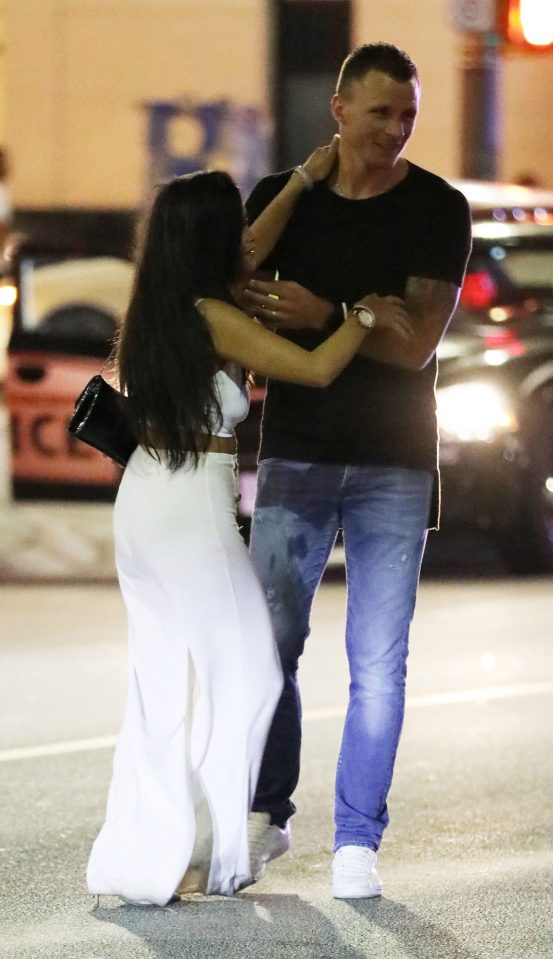  Fellow player Frédéric Brillant approaches the limo with the woman who was later seen with Rooney by hotel lifts