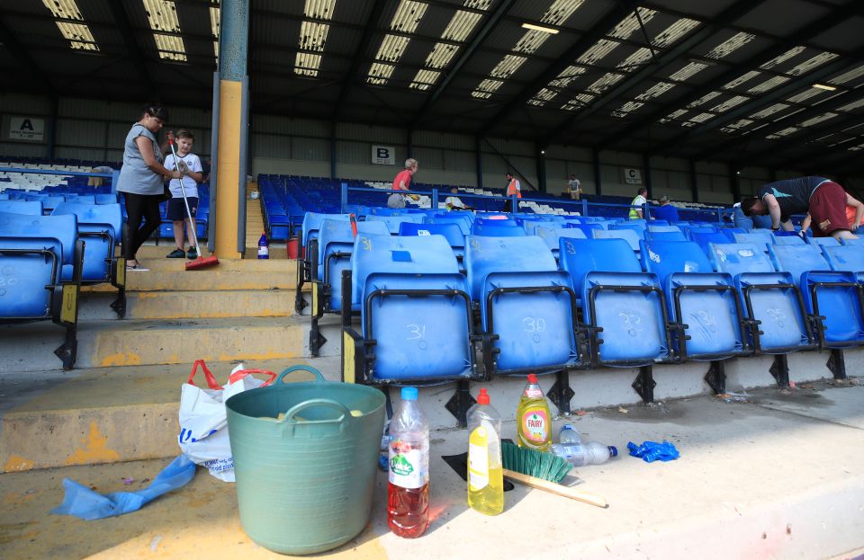  Fans brought their buckets and cleaning materials - but their efforts were in vain