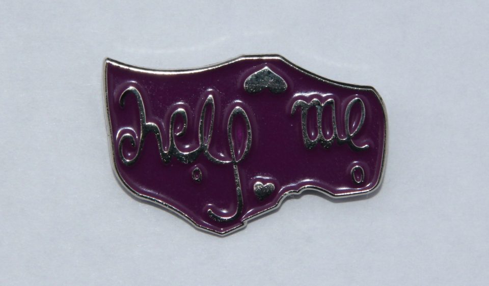  Before Maisie's funeral, Helen had 750 'I'm fine, Help Me' pins made