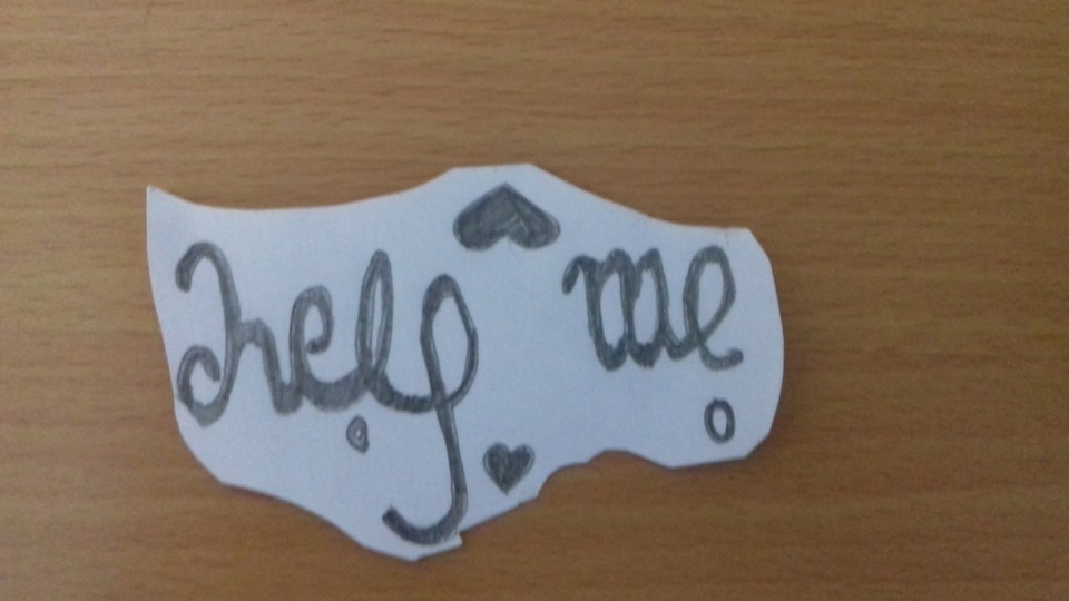  But when turned upside down it reads 'help me'