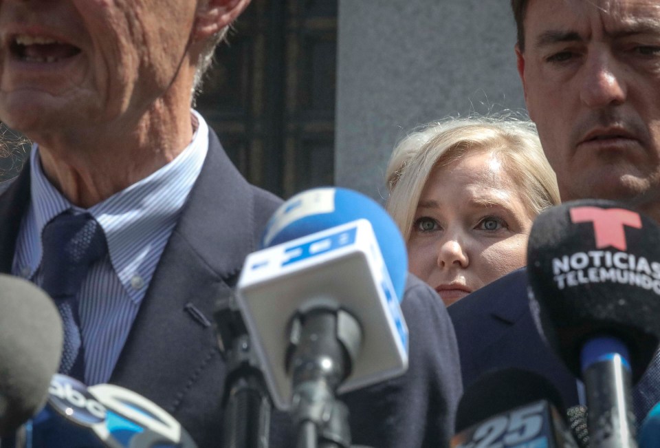  Virginia Roberts Giuffre, centre, with lawyers David Boies, left, and Brad Edwards outside the court in New York